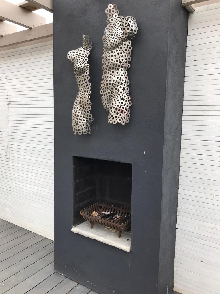 Rendered navy outdoor fireplace in Aldeburgh, Suffolk